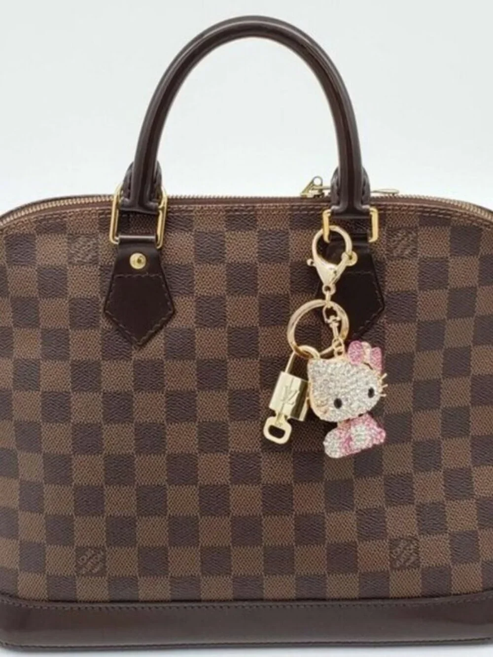 LV Authentic Gold Lock & Key 🔑Luxury Bag Charm w/Unbranded Hello Kitty Keychain
